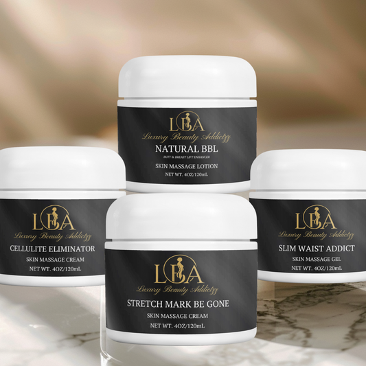 Set of four skincare jars with black labels on a marble surface