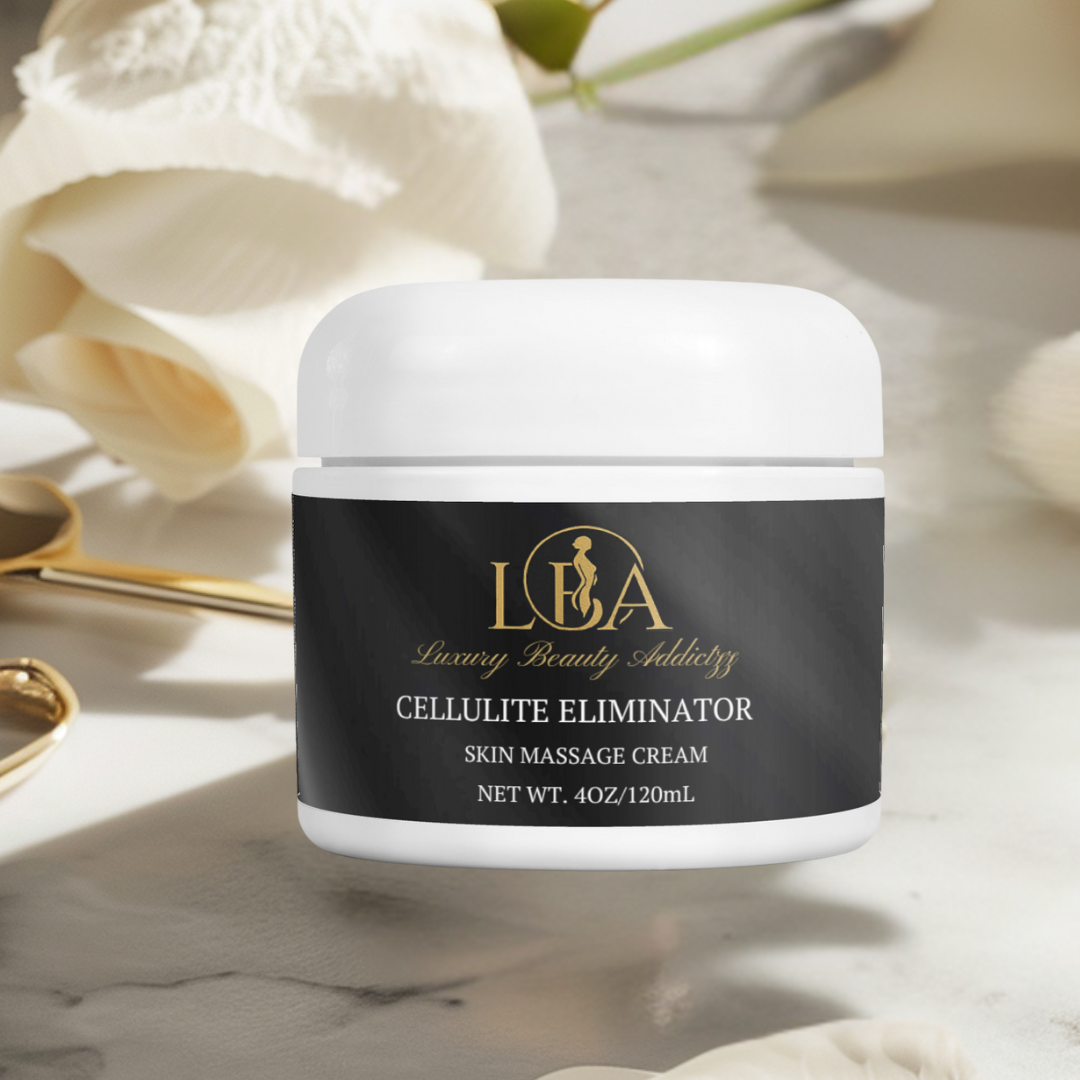 Jar of 'Cellulite Eliminator' cream with 'LBA' branding on a marble surface with flowers.