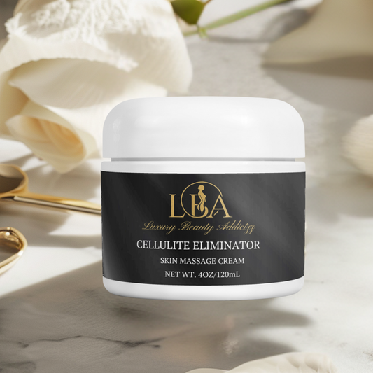 Jar of 'Cellulite Eliminator' cream with 'LBA' branding on a marble surface with flowers.