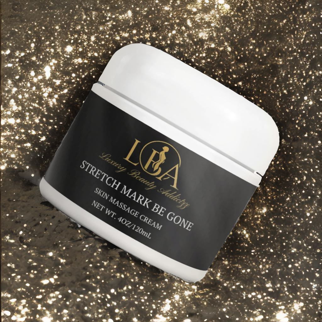 Jar of Stretch Mark Be Gone cream with glittery background